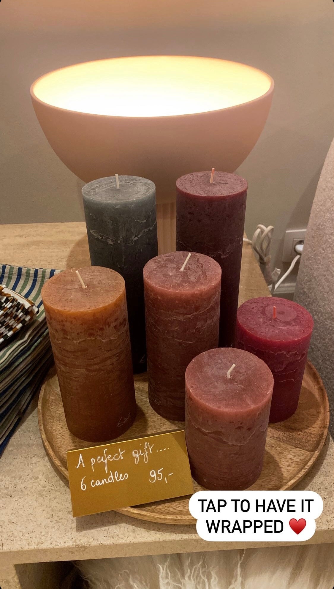 Set of six candles wrapped as a gift
